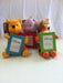immagine-1-dedit-peluche-porta-foto-winnie-the-pooh-ean-3298060212779