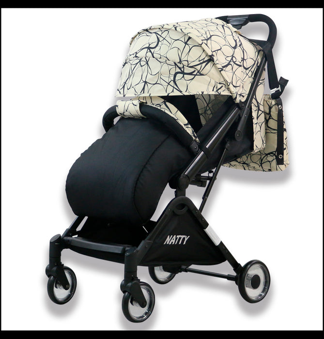 immagine-1-nunu-nunu-passeggino-leggero-natty-arabesque-con-borsa-e-coprigambe-ean-8300301501100